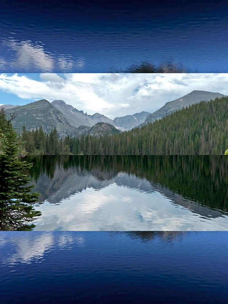 dark blue reflections in mountain lake
